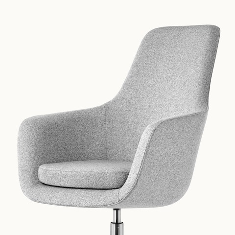 Angled view of the seat and back of a light gray Saiba Chair, showing the impeccable tailoring.