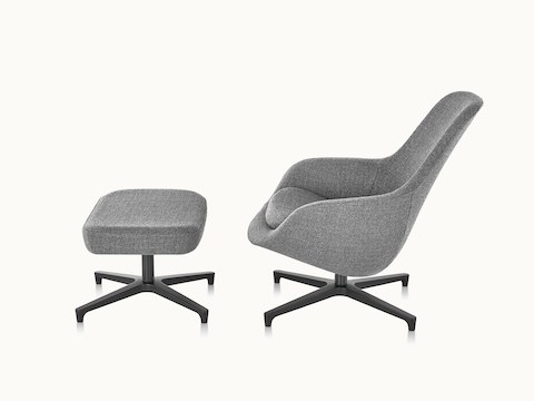 Side view of a gray Saiba Lounge Chair and Ottoman.