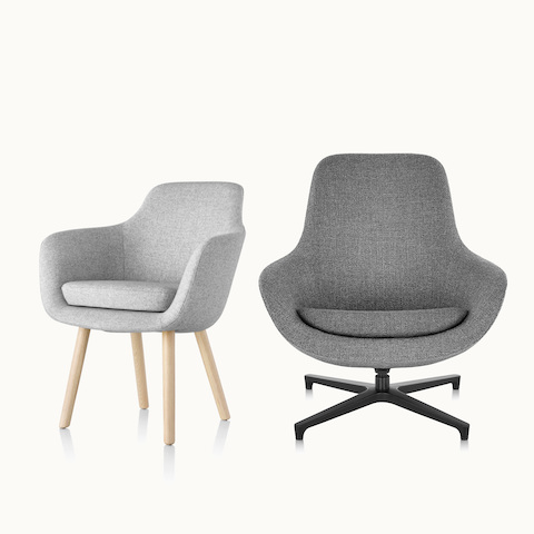 A Saiba Side Chair with light gray upholstery and a Saiba Lounge Chair with dark gray upholstery.
