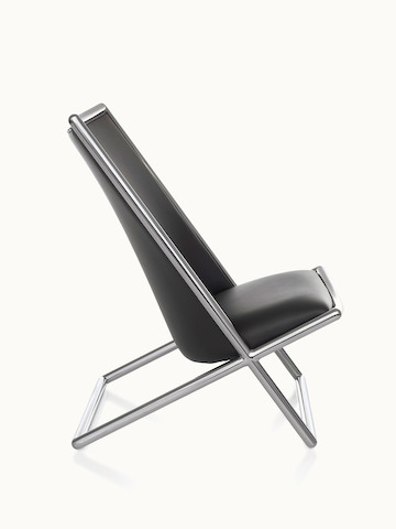 Side view of a Scissor lounge chair with black leather upholstery and a tubular steel frame.