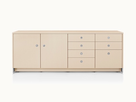 A four-unit Sled Base Storage credenza with a light wood finish and a combination of hinged doors, box drawers, and file storage.