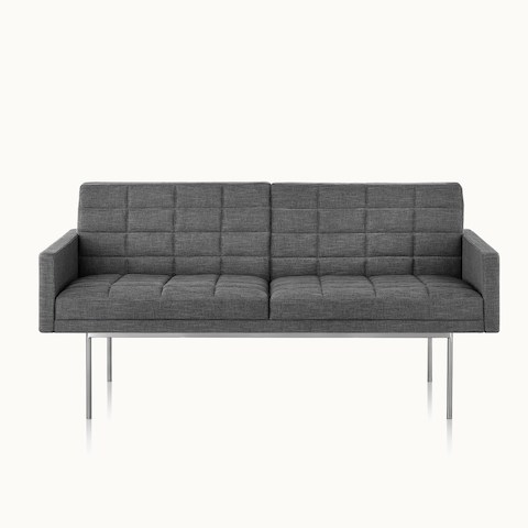 A quilted Tuxedo Component settee upholstered in gray fabric, viewed from the front.