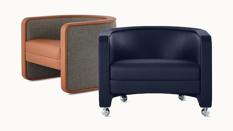 Pair of U-Series Lounge Chairs, one upholstered in Wool Tweed Umber and the other upholstered in Tenera Sapphire.