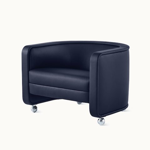 U-Series Lounge Chair with casters upholstered in Tenera Sapphire.