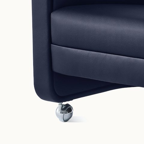 U-Series Lounge Chair with casters upholstered in Tenera Sapphire.