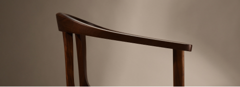 Lijn Armchair by Carole Baijings for Geiger in Persian Walnut frame, detail shot on a neutral background.