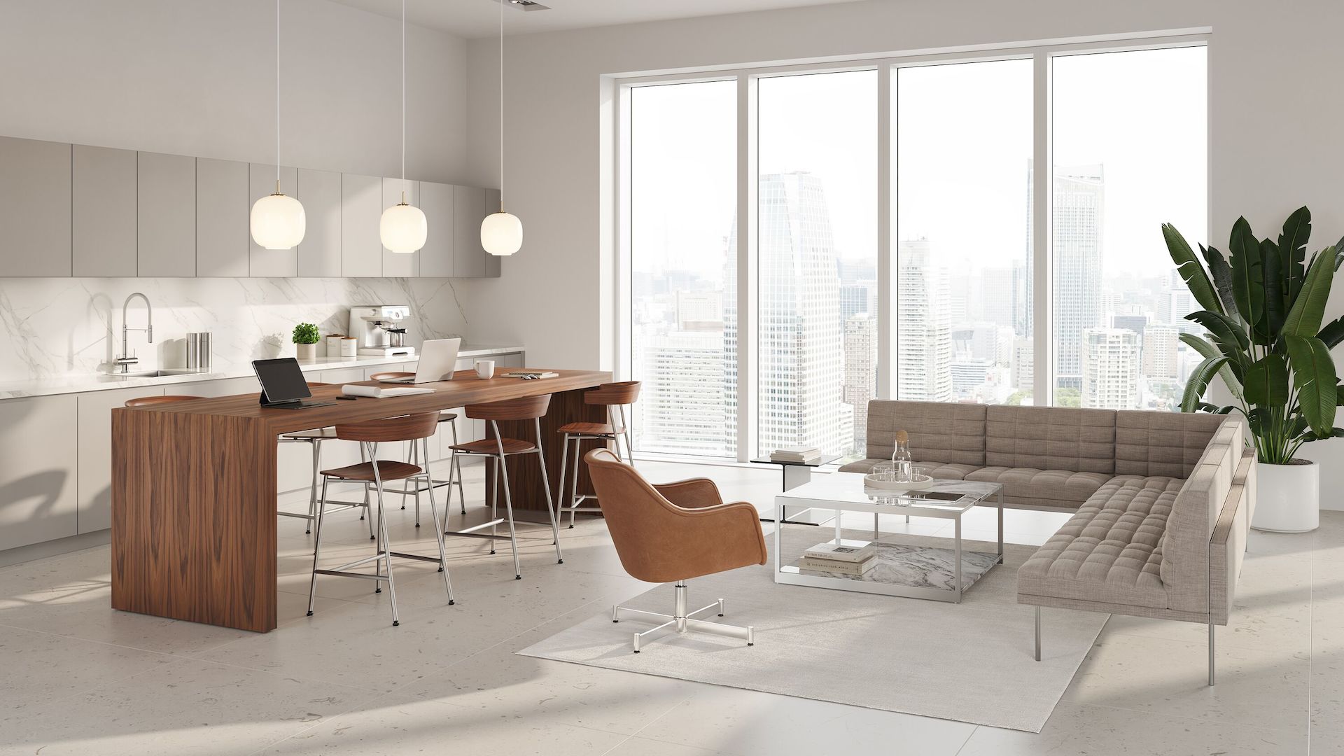 An environmental image of the JD Waterfall Table, by DatesWeiser, in an office kitchen setting. With Leeway Stools, Tuxedo Sofa and Bumper Lounge Chair reception area. 