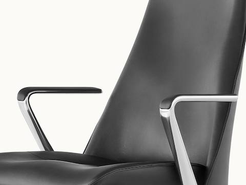 Angled view of a Taper office chair with black leather upholstery.