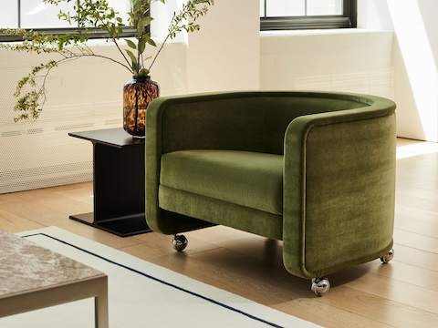 U Series Lounge Chair on casters in a contract lobby setting.